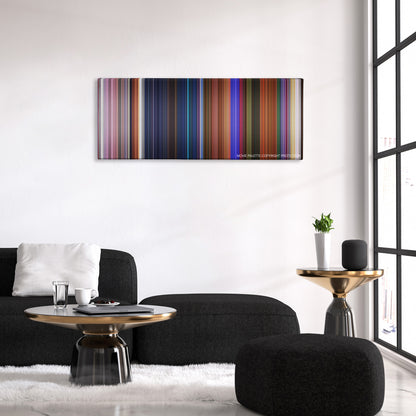 Journey to the Center of the Earth color palette canvas above a black sofa with a gold-topped table