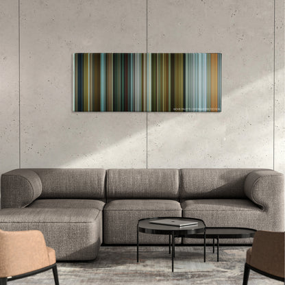 From Paris with Love color palette canvas on a concrete wall above a gray sectional sofa
