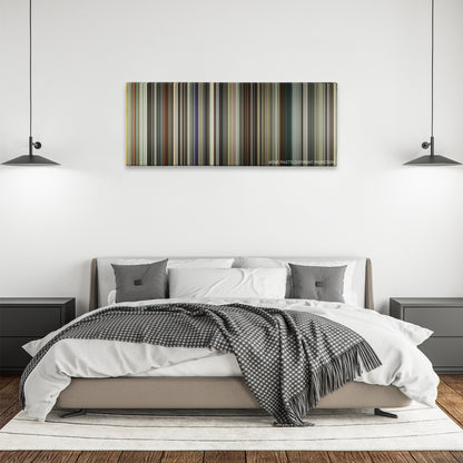 The Mule color palette canvas above a bed, between two black pendant lamps