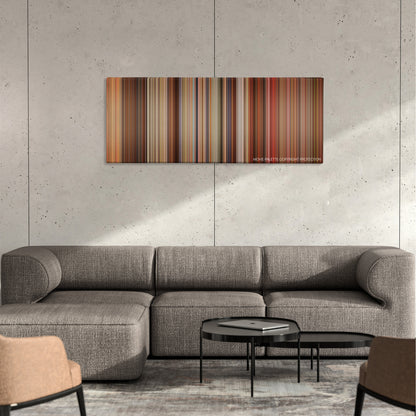 Any Given Sunday color palette canvas on a concrete wall above a gray sectional sofa