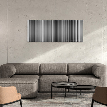 Yojimbo color palette canvas on a concrete wall above a gray sectional sofa