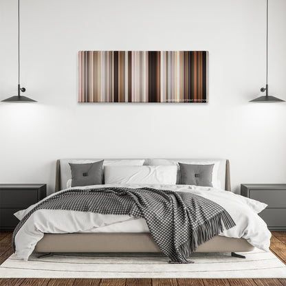 Parker color palette canvas above a bed, between two black pendant lamps