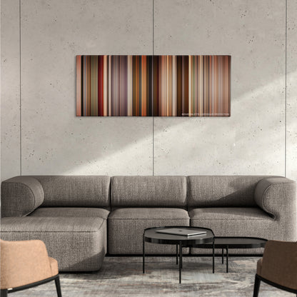 Pulp Fiction color palette canvas on a concrete wall above a gray sectional sofa