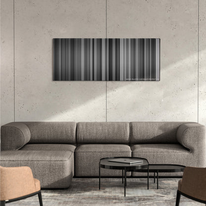 Schindler's List color palette canvas on a concrete wall above a gray sectional sofa