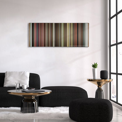 What Happens in Vegas color palette canvas above a black sofa with a gold-topped table