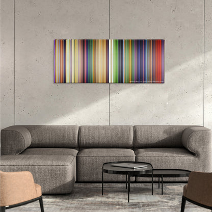 The Lion King color palette canvas on a concrete wall above a gray sectional sofa