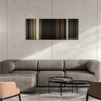 Us color palette canvas on a concrete wall above a gray sectional sofa