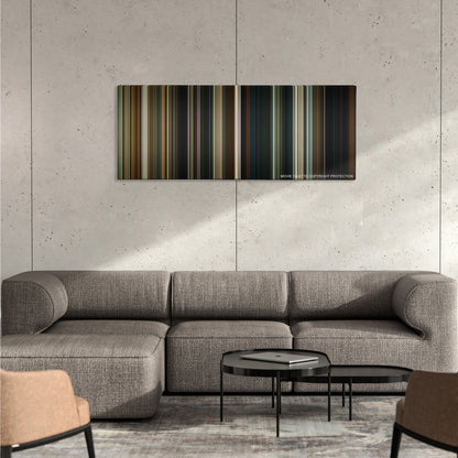 Hereditary color palette canvas on a concrete wall above a gray sectional sofa