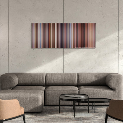 Two Weeks Notice color palette canvas on a concrete wall above a gray sectional sofa