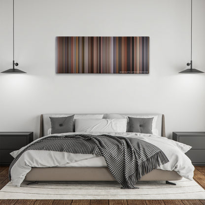Serendipity color palette canvas above a bed, between two black pendant lamps