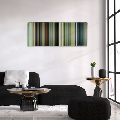 Wonder Woman 1984 color palette canvas above a black sofa with a gold-topped table