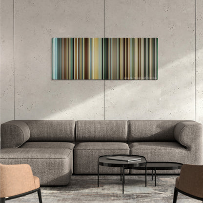 Into the Wild color palette canvas on a concrete wall above a gray sectional sofa