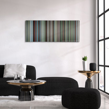 The Tree of Life color palette canvas above a black sofa with a gold-topped table