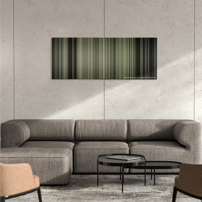 Gran Torino color palette canvas on a concrete wall above a gray sectional sofa