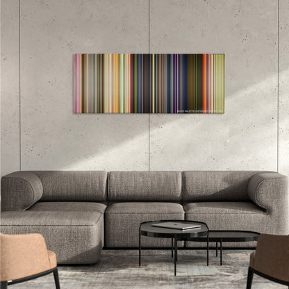 Toy Story 3 color palette canvas on a concrete wall above a gray sectional sofa