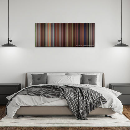 Cruel Intentions color palette canvas above a bed, between two black pendant lamps