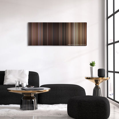 Red Eye color palette canvas above a black sofa with a gold-topped table