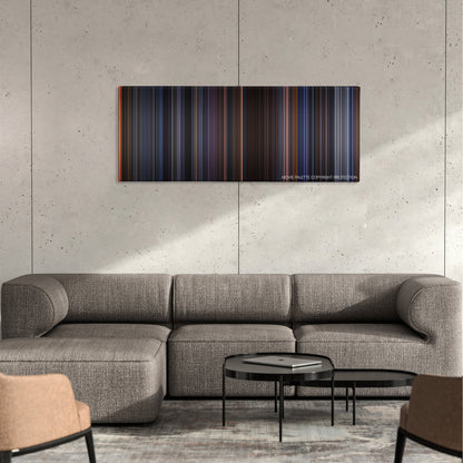 Judge Dredd color palette canvas on a concrete wall above a gray sectional sofa