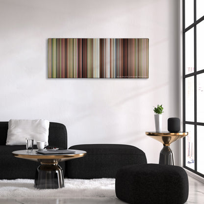Caddyshack color palette canvas above a black sofa with a gold-topped table