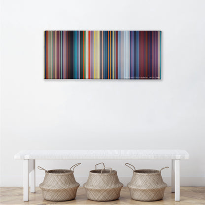 Mulan color palette canvas above a white bench with three woven baskets
