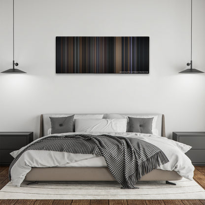 Batman color palette canvas above a bed, between two black pendant lamps