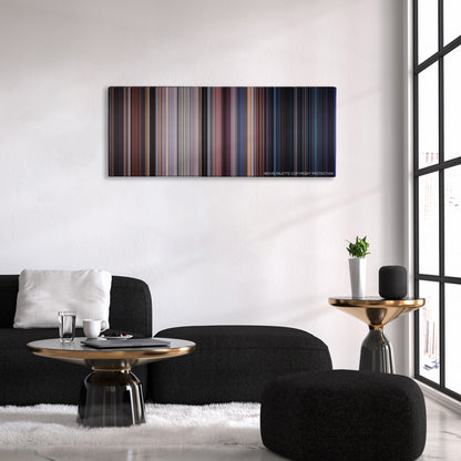 Lethal Weapon 2 color palette canvas above a black sofa with a gold-topped table