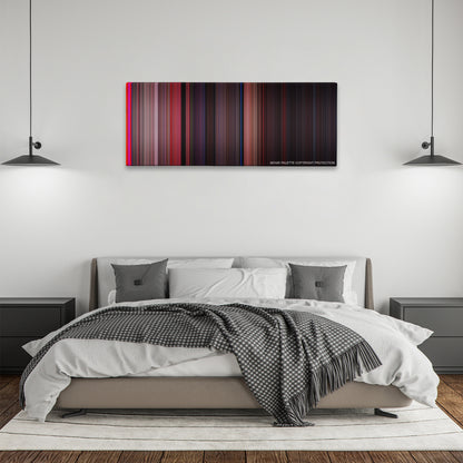 West Side Story color palette canvas above a bed, between two black pendant lamps