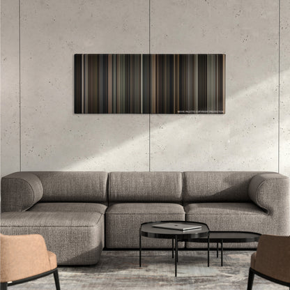 Sherlock Holmes color palette canvas on a concrete wall above a gray sectional sofa