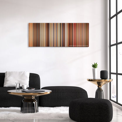 Any Given Sunday color palette canvas above a black sofa with a gold-topped table