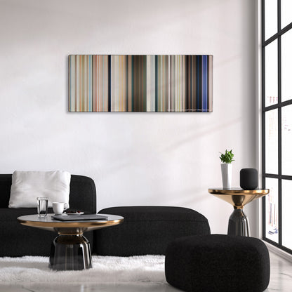Baywatch color palette canvas above a black sofa with a gold-topped table