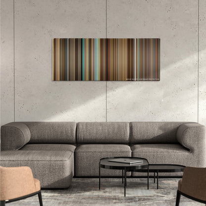Kingsman: The Secret Service color palette canvas on a concrete wall above a gray sectional sofa