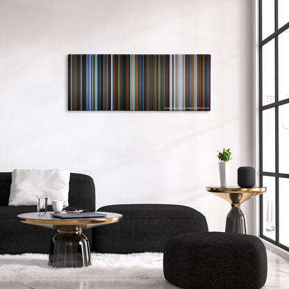I Saw the Devil color palette canvas above a black sofa with a gold-topped table