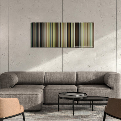 12 Years a Slave color palette canvas on a concrete wall above a gray sectional sofa