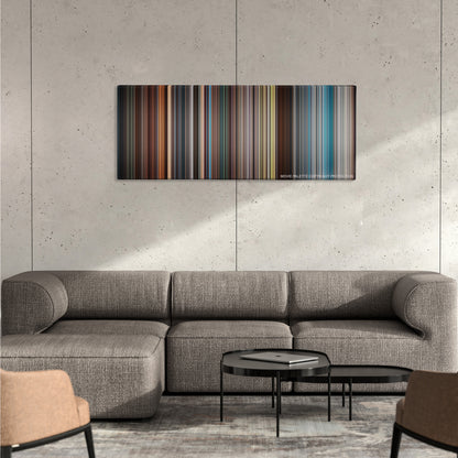 X-Men: First Class color palette canvas on a concrete wall above a gray sectional sofa