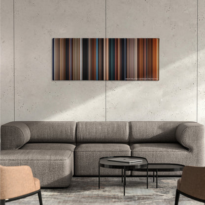 I Am Legend color palette canvas on a concrete wall above a gray sectional sofa