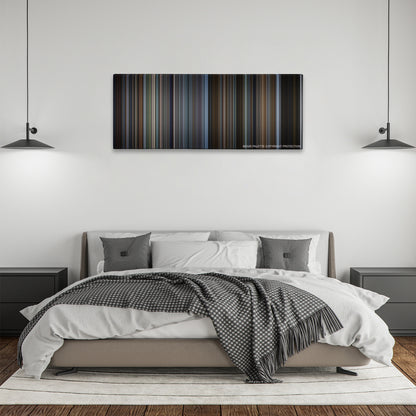 The Bourne Identity color palette canvas above a bed, between two black pendant lamps