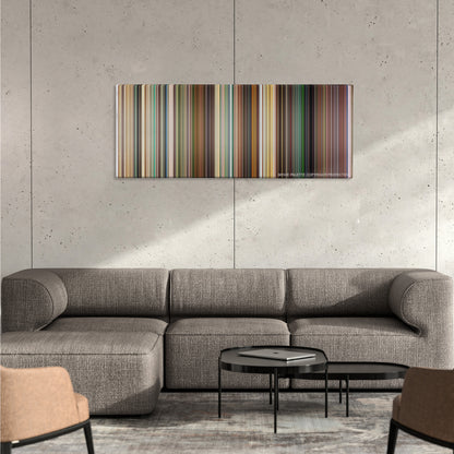 Kick-Ass color palette canvas on a concrete wall above a gray sectional sofa