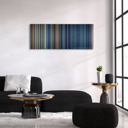 Armageddon color palette canvas above a black sofa with a gold-topped table