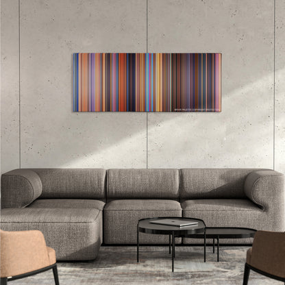 Toy Story 2 color palette canvas on a concrete wall above a gray sectional sofa