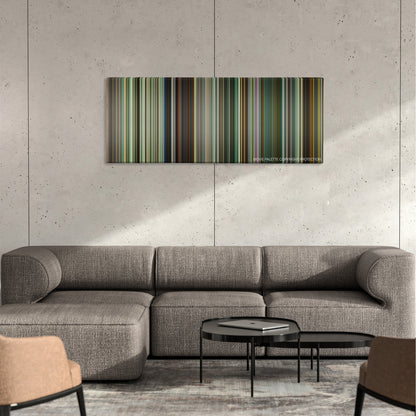 Trance color palette canvas on a concrete wall above a gray sectional sofa