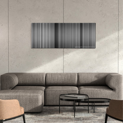 Witness for the Prosecution color palette canvas on a concrete wall above a gray sectional sofa