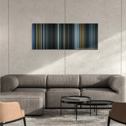 Prometheus color palette canvas on a concrete wall above a gray sectional sofa