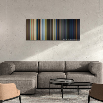 Homefront color palette canvas on a concrete wall above a gray sectional sofa