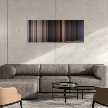 Back to the Future Part II color palette canvas on a concrete wall above a gray sectional sofa