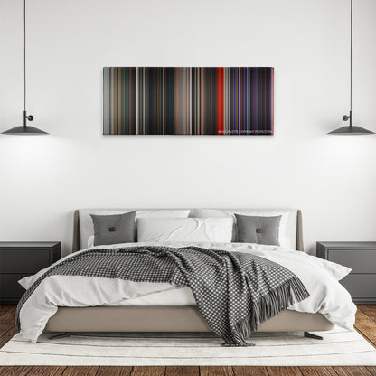 Mortal Engines color palette canvas above a bed, between two black pendant lamps
