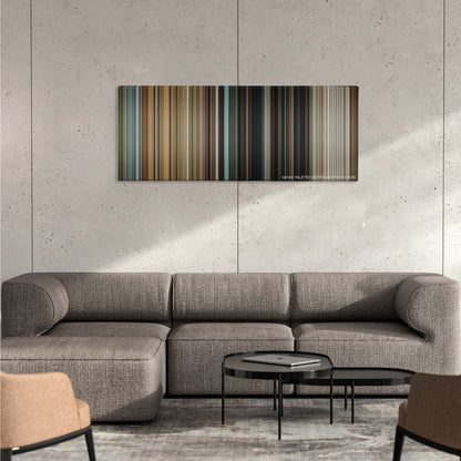 Rise of the Planet of Apes color palette canvas on a concrete wall above a gray sectional sofa