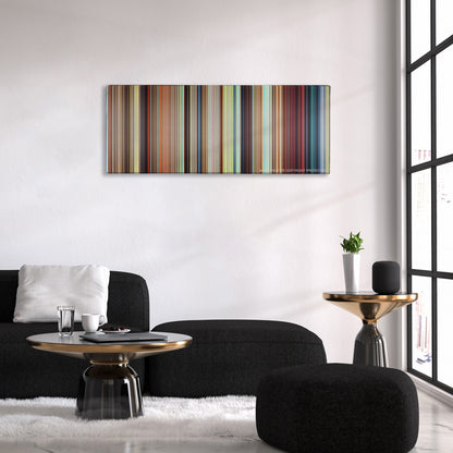 Howl's Moving Castle color palette canvas above a black sofa with a gold-topped table