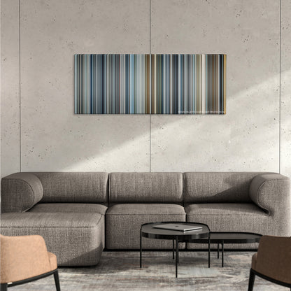 Minority Report color palette canvas on a concrete wall above a gray sectional sofa