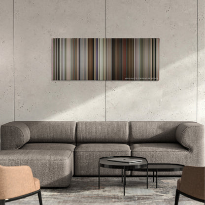 Borat Subsequent Moviefilm color palette canvas on a concrete wall above a gray sectional sofa