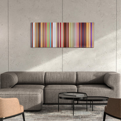 The Boss Baby color palette canvas on a concrete wall above a gray sectional sofa